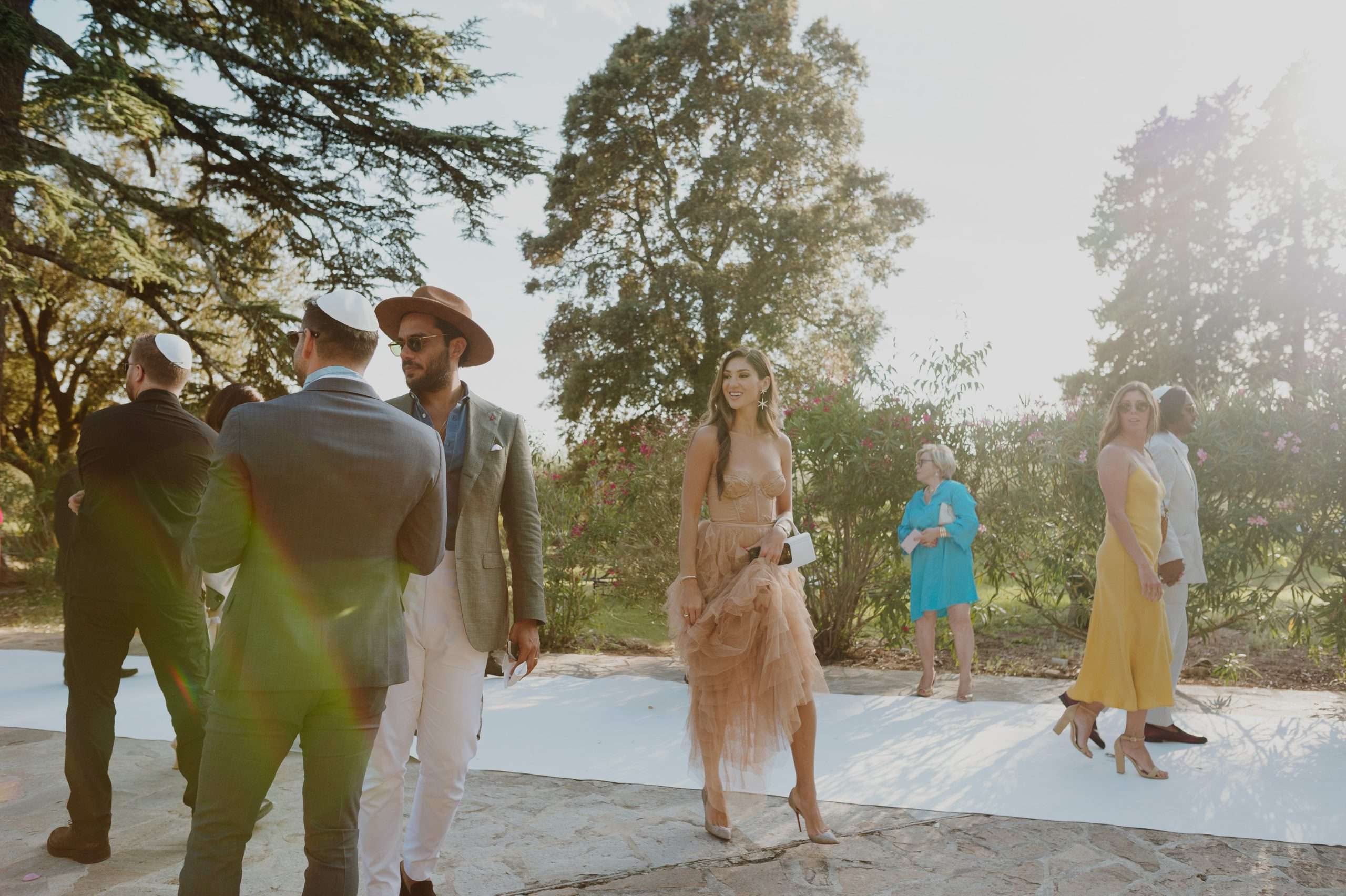 Wedding guest walking at destination wedding South of France