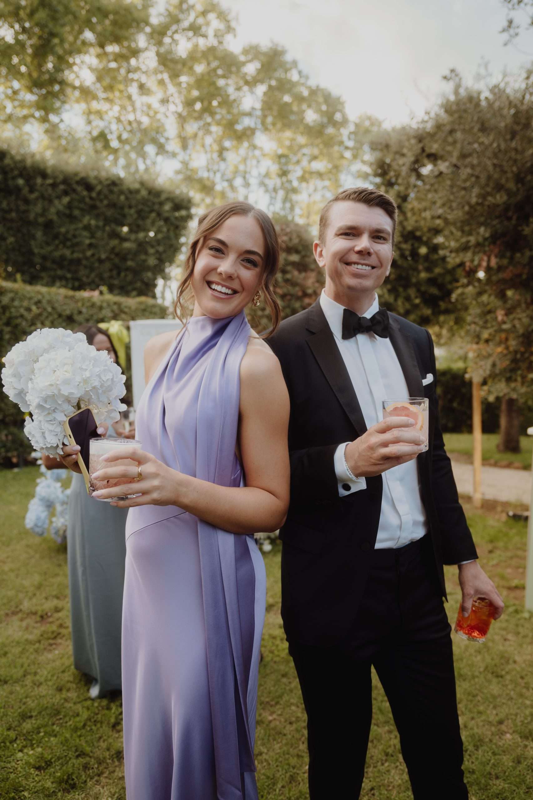 Wedding guests holding drinks