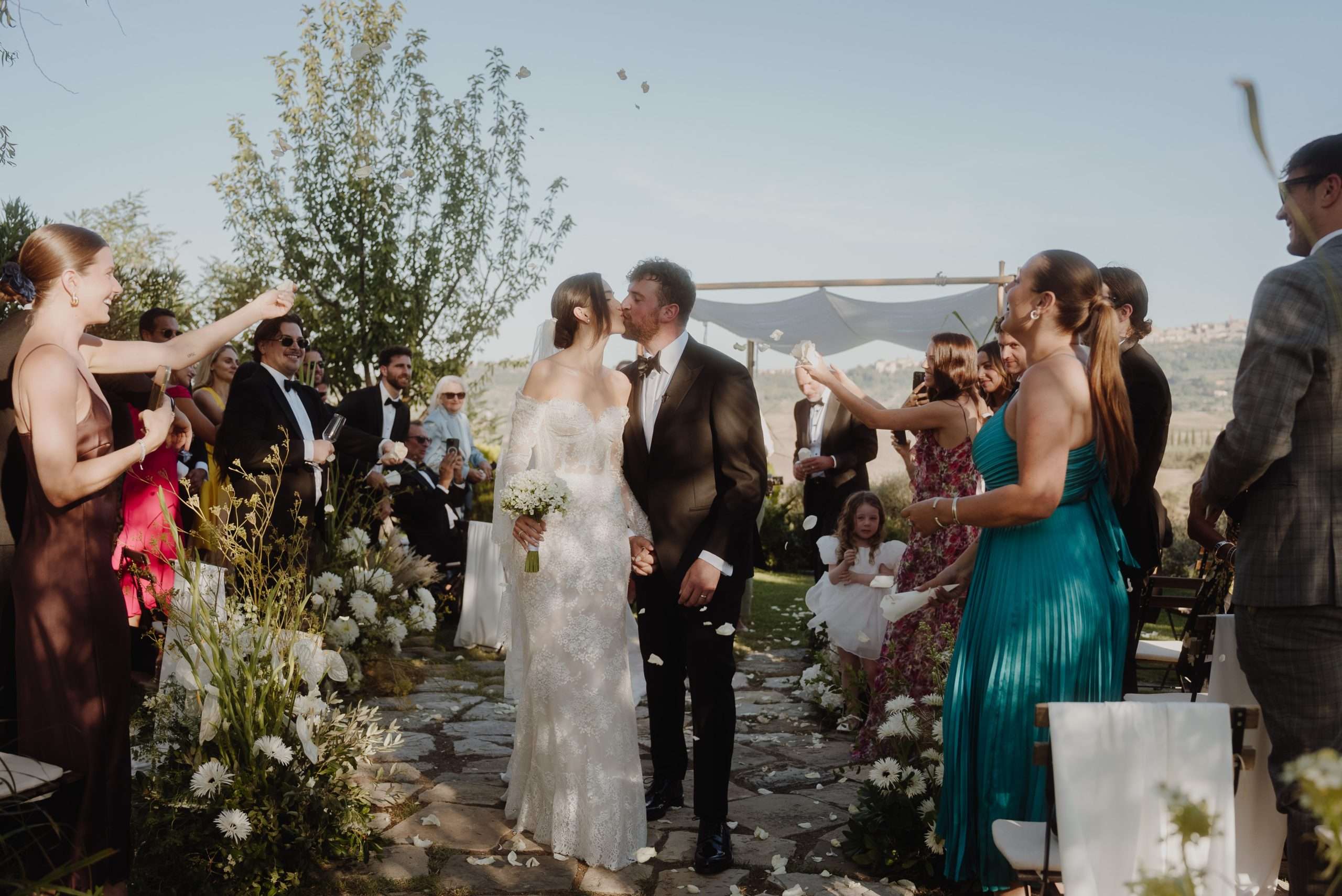 Bride and groom exiting the aisle at Lupaia Tuscany Italy