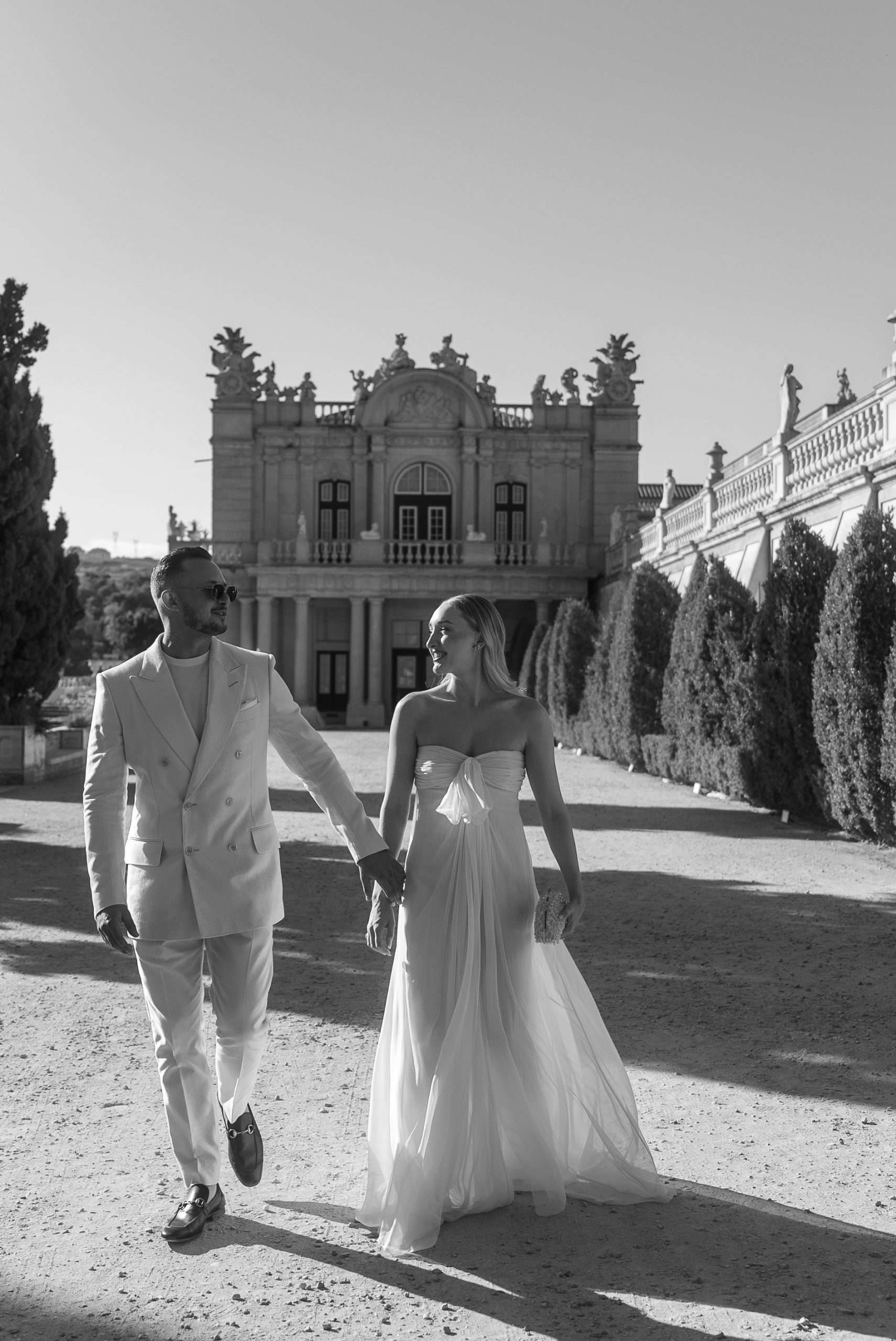 Bride and groom portrait at Queluz Palace gardens Portugal
