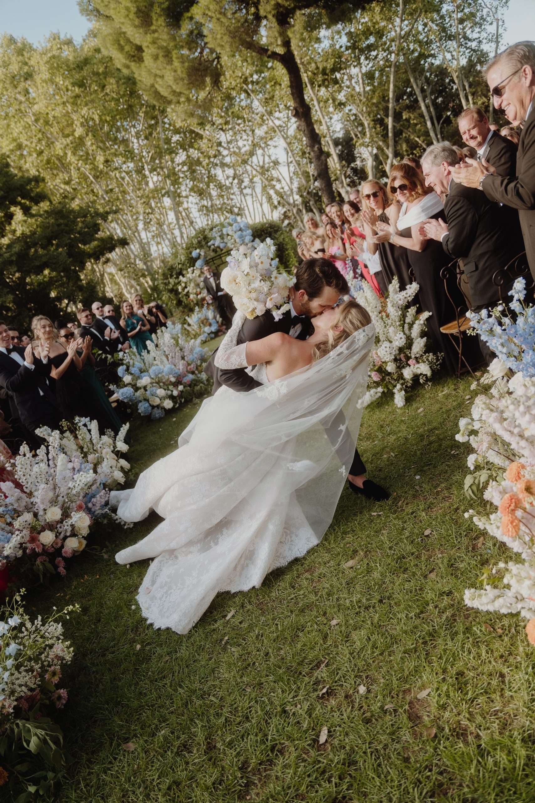 Bride and groom kissing during ceremony at Villa Aurelia Rome Italy